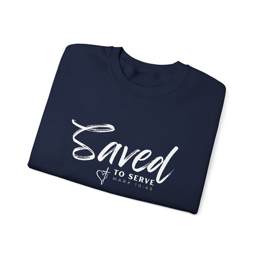 Front view of folded Saved to Serve Crewneck sweatshirt. This Christian themed clothing is the perfect way to wear your faith boldly. Spreading the word of God through this bible verse sweatshirt is the purpose of serving our God. 